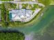Luxury waterfront home with private pool and dock, seen from above at 750 Penfield St, Longboat Key, FL 34228
