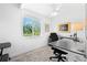 Bright home office with a desk and window views at 750 Penfield St, Longboat Key, FL 34228