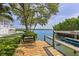 Steps from the house to your own private dock at 750 Penfield St, Longboat Key, FL 34228