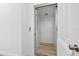 Modern elevator with light wood flooring and white walls at 750 Penfield St, Longboat Key, FL 34228