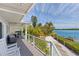 Relaxing deck overlooking the water with seating and beautiful views at 750 Penfield St, Longboat Key, FL 34228