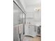 Clean bathroom with white vanity and walk-in shower at 750 Penfield St, Longboat Key, FL 34228