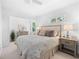 Charming bedroom with a queen bed and dresser at 750 Penfield St, Longboat Key, FL 34228