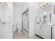 Modern bathroom with a walk-in shower and double vanity at 750 Penfield St, Longboat Key, FL 34228