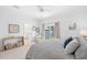 Main bedroom with water views and a sitting area at 750 Penfield St, Longboat Key, FL 34228