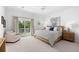 Main bedroom with private access to balcony and water views at 750 Penfield St, Longboat Key, FL 34228