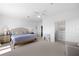 Spacious main bedroom with king bed and walk-in closet at 750 Penfield St, Longboat Key, FL 34228