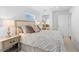 Guest bedroom with ample closet space and neutral decor at 750 Penfield St, Longboat Key, FL 34228