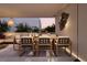 Outdoor patio with dining furniture and built-in grill at 1611 4Th St # B6, Sarasota, FL 34236