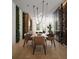Elegant dining room featuring a long table and modern lighting at 1611 4Th St # B6, Sarasota, FL 34236