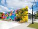 Building with vibrant mural art on its side at 1611 4Th St # B6, Sarasota, FL 34236