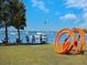 Scenic park with artists painting and a unique orange sculpture at 1611 4Th St # B6, Sarasota, FL 34236