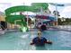 Community water park with multiple slides and lifeguard at 2017 Lovoy Ct, North Port, FL 34288