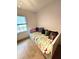 Cozy bedroom with a twin-size daybed, ideal for guests or children at 623 147Th E St, Bradenton, FL 34212
