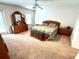 Large main bedroom with a king-size bed and ample closet space at 623 147Th E St, Bradenton, FL 34212