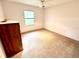 Spacious bedroom with plenty of room for furniture and a large window at 623 147Th E St, Bradenton, FL 34212