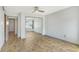 Bright bedroom with tile flooring and mirrored closet doors at 1350 N Portofino Dr # 310, Sarasota, FL 34242