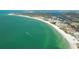 Aerial view of coastline, highlighting beach and residential areas at 1350 N Portofino Dr # 310, Sarasota, FL 34242