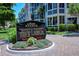 Fiesta Harbor community sign with building numbers and directions at 1350 N Portofino Dr # 310, Sarasota, FL 34242