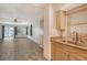 Kitchen with light wood cabinets and stainless steel sink at 1350 N Portofino Dr # 310, Sarasota, FL 34242