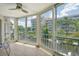 Spacious screened balcony with water and community views at 1350 N Portofino Dr # 310, Sarasota, FL 34242
