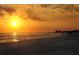 Stunning sunset view over the ocean and beach at 1350 N Portofino Dr # 310, Sarasota, FL 34242