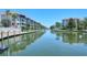 Waterfront community with lush landscaping and boats at 1350 N Portofino Dr # 310, Sarasota, FL 34242