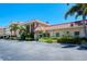 Building exterior with parking and landscaping at 1350 N Portofino Dr # 310, Sarasota, FL 34242