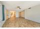 Open living room and kitchen with tile flooring at 1350 N Portofino Dr # 310, Sarasota, FL 34242