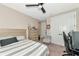 Spacious bedroom with dresser and sitting chair at 6358 Rivo Lakes Blvd, Sarasota, FL 34241