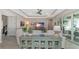 Living area showcasing a stylish console table and relaxing atmosphere at 6358 Rivo Lakes Blvd, Sarasota, FL 34241