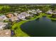 Lakefront property highlighted in a community of luxury homes at 6358 Rivo Lakes Blvd, Sarasota, FL 34241