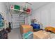 Garage with overhead storage and bikes at 6358 Rivo Lakes Blvd, Sarasota, FL 34241