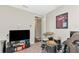 Music room with a drum set and a TV for entertainment at 6358 Rivo Lakes Blvd, Sarasota, FL 34241