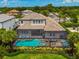 Relaxing pool and spa area with covered lanai at 6358 Rivo Lakes Blvd, Sarasota, FL 34241