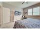 Bedroom with double bed, dresser, and TV at 8930 Tuscany Isles Dr, Punta Gorda, FL 33950