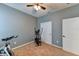 Bright room with exercise equipment, carpeted floor, and ample space at 4247 Adelaar Dr, Sarasota, FL 34240