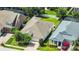 Aerial view of a house nestled amongst other homes at 4247 Adelaar Dr, Sarasota, FL 34240