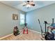 Small home gym with an elliptical and stationary bike at 4247 Adelaar Dr, Sarasota, FL 34240