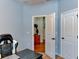 Home office with desk, chair, and access to other rooms at 4247 Adelaar Dr, Sarasota, FL 34240