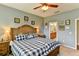 Main bedroom with ensuite bathroom access and a large bed at 4247 Adelaar Dr, Sarasota, FL 34240