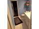 Bathroom with vanity and pool access at 4607 Masefield Pl, Sarasota, FL 34241