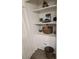 Well-organized linen closet with shelves at 4607 Masefield Pl, Sarasota, FL 34241