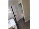 Bathroom linen closet with shelves for storage at 4607 Masefield Pl, Sarasota, FL 34241