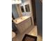 Bathroom with single vanity and hexagon tile floor at 4607 Masefield Pl, Sarasota, FL 34241
