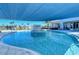 Community pool with a fountain and shade structure at 10434 Spring Tide Way, Parrish, FL 34219