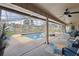 Inviting screened pool and spa with ample patio space at 4607 Masefield Pl, Sarasota, FL 34241