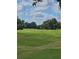 Landscaped golf course with lush greens at 4607 Masefield Pl, Sarasota, FL 34241