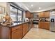 Updated kitchen featuring stainless steel appliances and wood cabinets at 4607 Masefield Pl, Sarasota, FL 34241