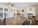 Open living area with tile flooring, French doors, and a view to the dining area at 4607 Masefield Pl, Sarasota, FL 34241
